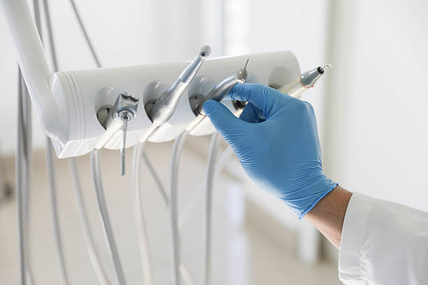 Professional Tooth Extraction technician working in Ashville, OH